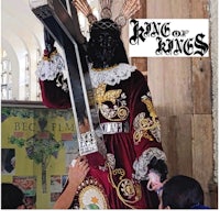 a statue of a king in a church