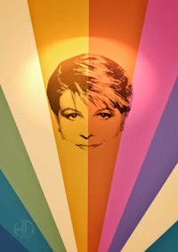 an image of a woman with a colorful background