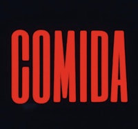 a red sign with the word comida on it