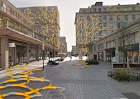 a street with a lot of buildings and trees