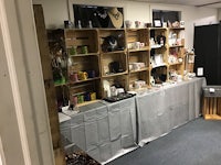 a room with a lot of items on display