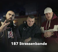 a group of men standing next to each other with the words 187 strassenbande