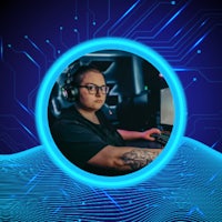 an image of a woman with headphones in front of a computer screen