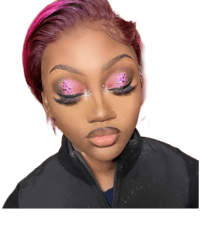 a woman with pink eye makeup and a black jacket