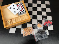 a chess set with a wooden box and a chess board