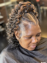 a woman getting her hair done in a salon