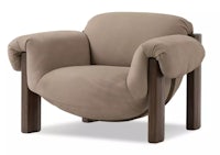 a beige lounge chair with wooden legs