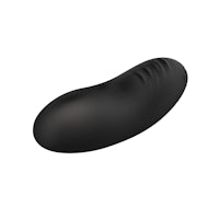 a black sex toy on a white background