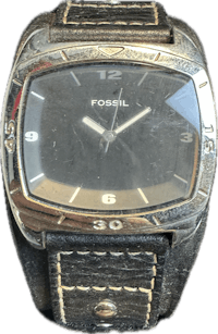 a fossil watch with a leather strap