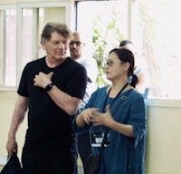 a man and a woman standing next to each other