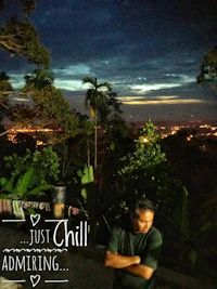 a man standing in front of a tree at night with a quote