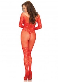 the back view of a woman in a red fishnet bodystocking