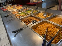 a buffet with a lot of food on it