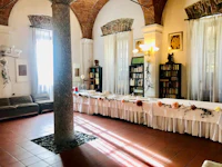 a room with a table and chairs in it