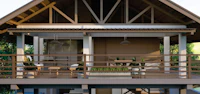 a 3d rendering of a house with a balcony