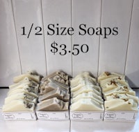 a variety of soaps are displayed on a counter