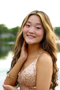 a young asian woman posing for a photo