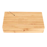 a bamboo cutting board with an arrow on it