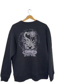 a black sweatshirt with an image of a scorpion on it