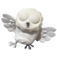a white figurine of an owl with wings
