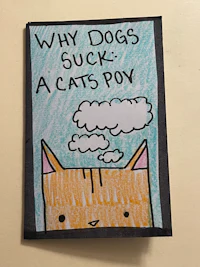 a drawing of a cat hanging on a wall