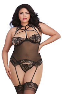 a plus size woman in black lingeries and stockings