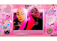 two girls with pink hair and pink makeup on a computer screen
