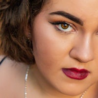 a woman wearing a necklace