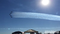 a group of airplanes flying in the sky
