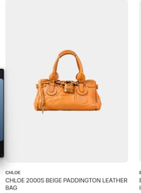 a bag with a cell phone next to it