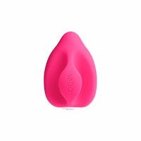 a pink vibrator on a white background
