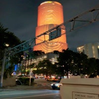 a tall building is lit up at night