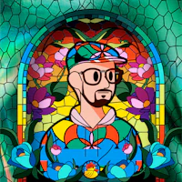 a stained glass window with a man in a hat