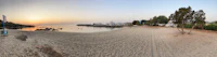 a 360 degree view of a beach at sunset