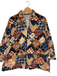 a women's jacket with a colorful pattern on it