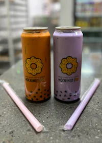two cans of bubble tea next to each other