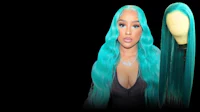 a woman is wearing a turquoise wig