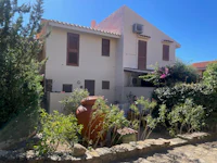 a house with a garden in front of it