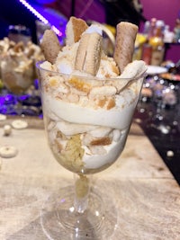banana pudding in a glass on a table