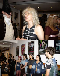 a group of people standing in a room