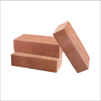 three red bricks on a black background