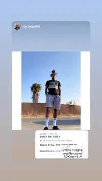 a picture of a man standing in front of a car