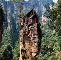 a house on top of a cliff in china