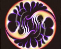 an image of a spiral with purple and yellow colors