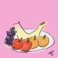 a plate of fruits and vegetables on a pink background