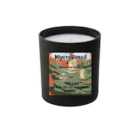 a black candle with an image of a skull and crossbones