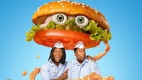 a poster for a movie with two people and a burger