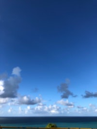 a blue sky with white clouds