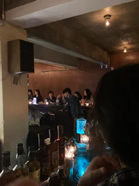 a group of people at a bar