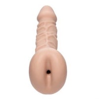 a plastic dildo on a white background